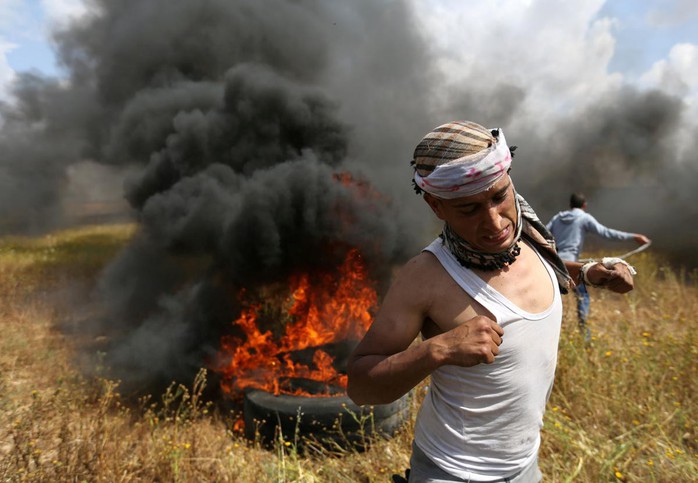 Ngày đẫm máu ở Gaza, Israel không ngần ngại bắn đạn thật - Ảnh 5.
