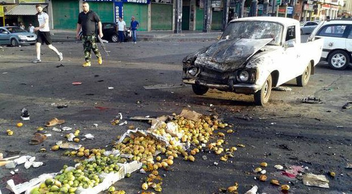 IS đánh bom tự sát hàng loạt ở Syria - Ảnh 1.