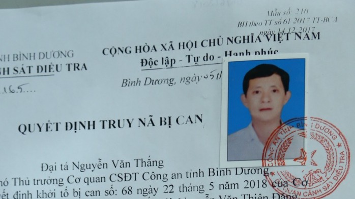 Chân dung trưởng phòng TN-MT Dĩ An trốn truy nã - Ảnh 1.