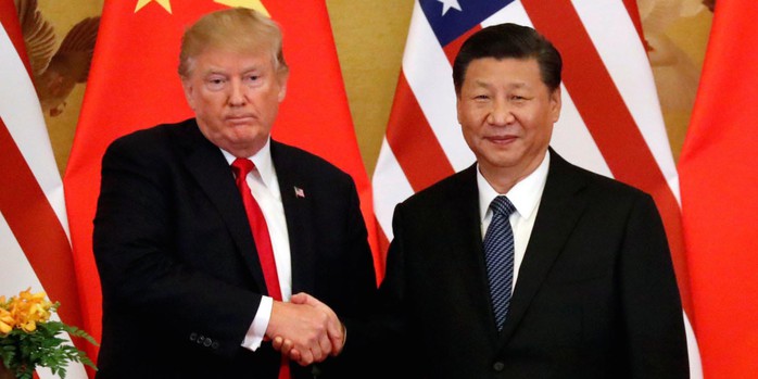 Ông Trump vừa đấm, vừa xoa Trung Quốc - Ảnh 1.