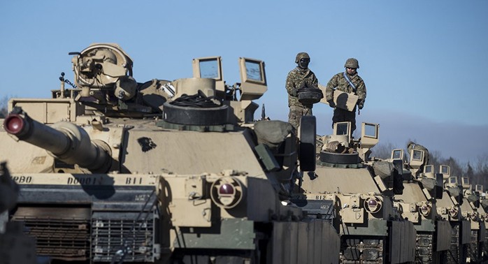 Nga thêm quân, Mỹ “sắp triển khai xe tăng ở Syria” - Ảnh 2.