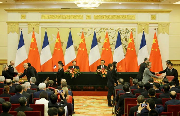 Giảm thương mại với Mỹ, Trung Quốc làm ăn với Pháp - Ảnh 1.