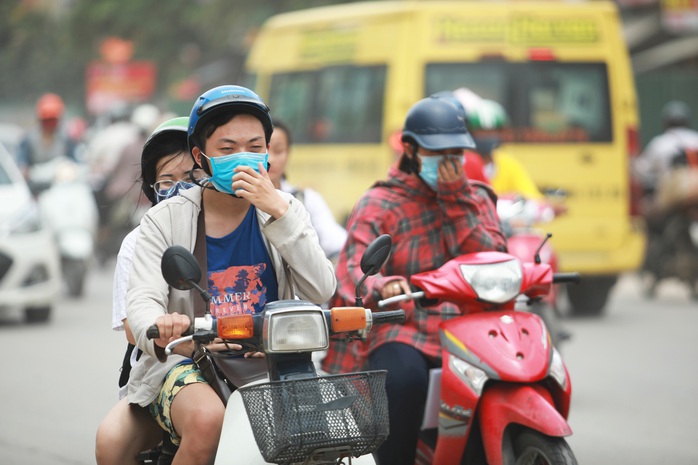 Họp khẩn bàn giải pháp chống ô nhiễm không khí ở Hà Nội và TP HCM - Ảnh 1.