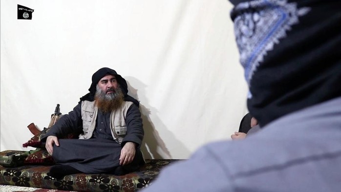 Thủ lĩnh tối cao IS tái xuất sau 5 năm biệt tích - Ảnh 1.