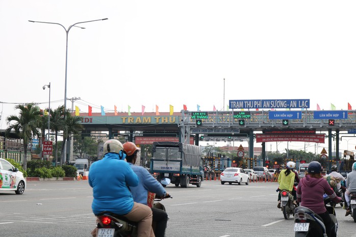 TP HCM: Ôtô của cơ quan nhà nước bắt đầu đồng loạt trả phí tự động không dừng - Ảnh 1.