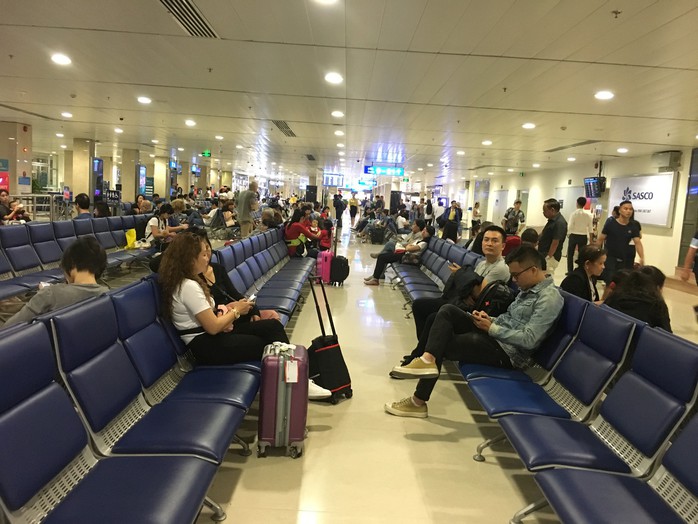 Sân bay Tân Sơn Nhất sẽ ngừng phát thanh tự động để bớt tiếng ồn - Ảnh 1.