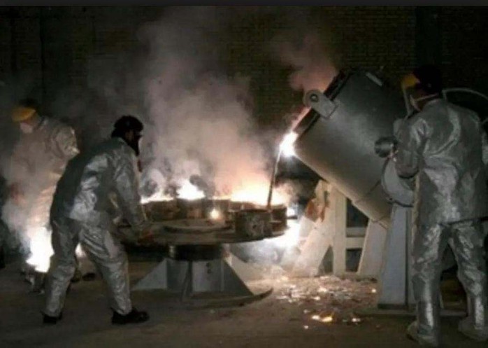Iran dọa tăng cấp độ làm giàu urani - Ảnh 1.