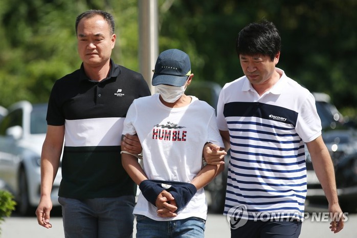 Hàn Quốc: Nghi phạm vụ đánh vợ Việt ra tòa - Ảnh 1.