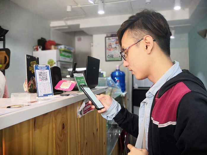 Cuộc chiến trên bàn thanh toán - Ảnh 2. Cuộc chiến trên bàn thanh toán - Ảnh 2.