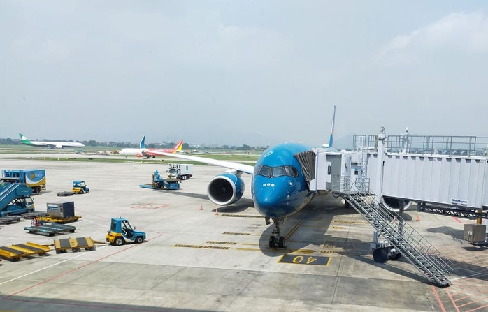 Lượng khách tăng cao, rút ngắn thời gian đóng cửa sân bay Nội Bài - Ảnh 1.