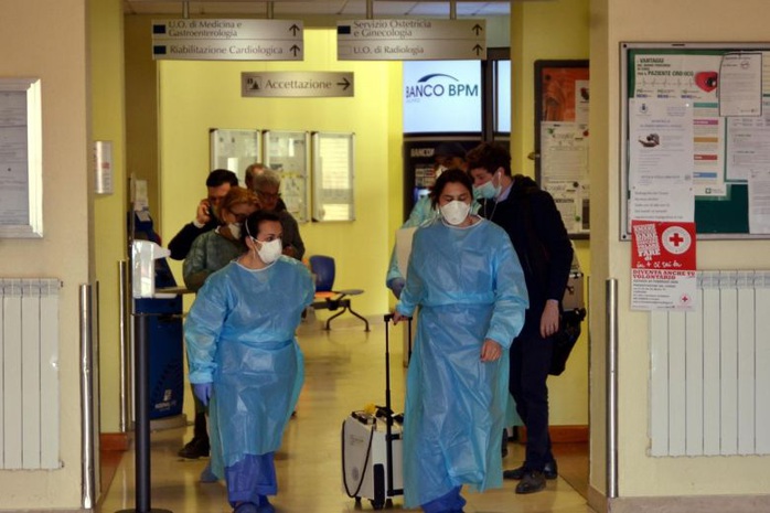 Ý và Iran thêm ca tử vong, Trung Quốc phát hiện ca nhiễm Covid-19 không có triệu chứng sau 27 ngày - Ảnh 1.