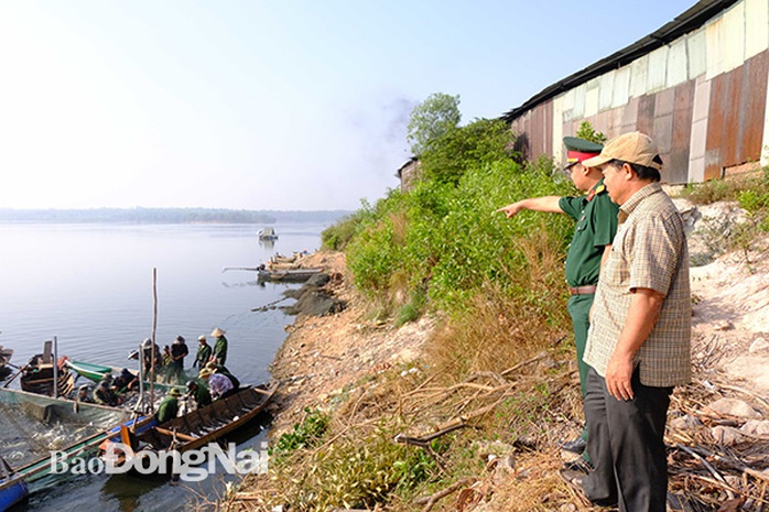 Đồng Nai: Nhiều người vây luồng cá nặng hàng tấn ở hồ sông Mây - Ảnh 3.