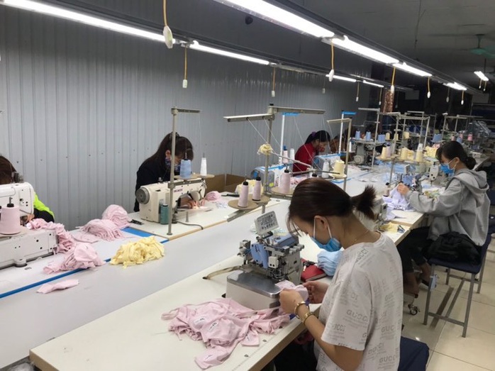 Việt Nam có thể sản xuất được bao nhiêu chiếc khẩu trang vải trong dịch corona? - Ảnh 1.