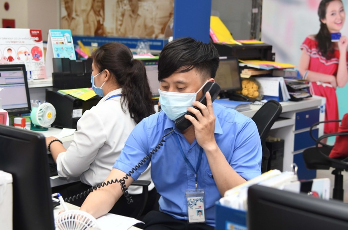 Hạn chế tụ tập đông người, siêu thị bán thịt, cá, trứng, rau… qua điện thoại - Ảnh 1.