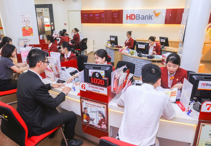 Nhiều ngân hàng giảm lãi vay, doanh nghiệp không cần chứng minh thiệt hại - Ảnh 1. Nhiều ngân hàng giảm lãi vay, doanh nghiệp không cần chứng minh thiệt hại - Ảnh 1.