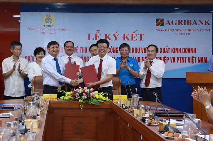 Tổng LĐLĐ Việt Nam và Ngân hàng NN-PTNT ký quy chế phối hợp để chăm lo cho đoàn viên - Ảnh 1.