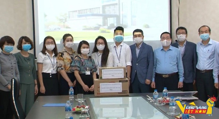 Khu công nghiệp “chung sống an toàn” cùng Covid-19 - Ảnh 2. Khu công nghiệp “chung sống an toàn” cùng Covid-19 - Ảnh 2.