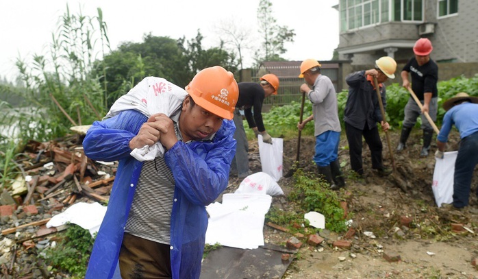 Trung Quốc: Nguy cơ lũ chồng lũ, vỡ đê bao diện rộng - Ảnh 2.