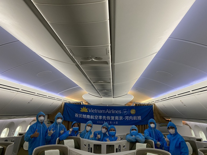 Vietnam Airlines bay chuyến chở khách đầu tiên đến Trung Quốc sau dịch - Ảnh 4.