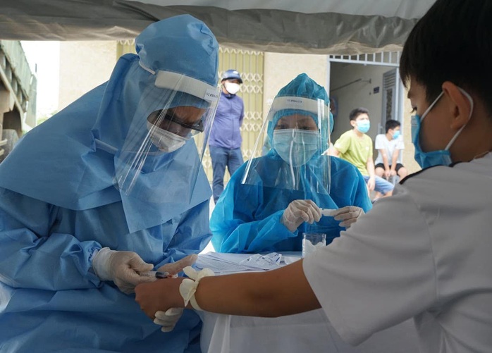 Ứng phó dịch Covid-19 nguy cơ lan rộng, Việt Nam lần đầu áp dụng gộp mẫu xét nghiệm SARS-CoV-2 - Ảnh 3.