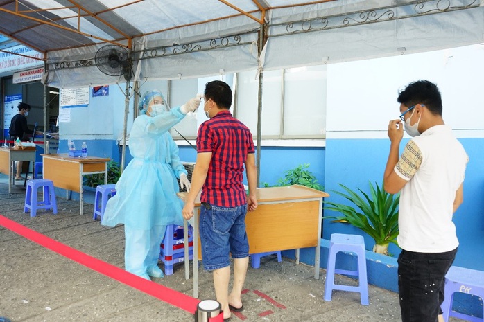 TP HCM công bố thêm hơn 3.300 xét nghiệm người về từ Đà Nẵng - Ảnh 1.