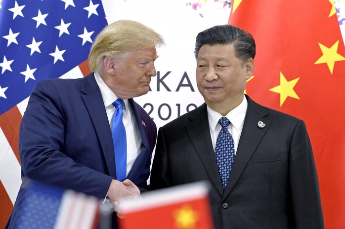 Tình báo Mỹ: Nga - Trung Quốc đấu đá vì Tổng thống Trump - Ảnh 1.