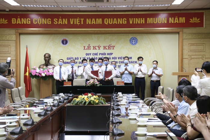   Bộ Y tế và Bảo hiểm Xã hội Việt Nam phối hợp phát triển BHYT - Ảnh 1.