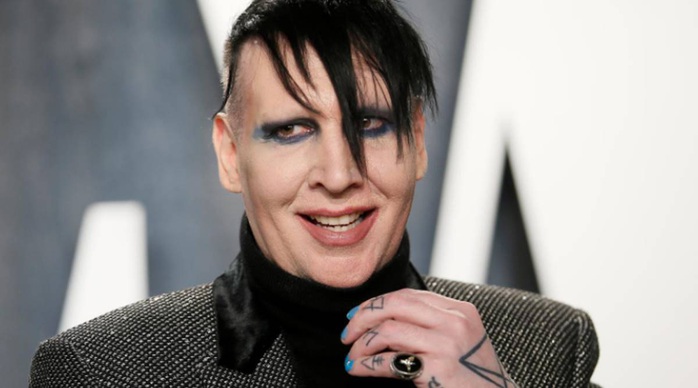 Rocker “lập dị” Marilyn Manson bịhất cẳng sau cáo buộc bạo hành - Ảnh 1.