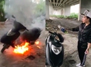 Khoe nhà giàu, cô gái mang xe ra chân cầu Phú Mỹ đốt Khoe nhà giàu, cô gái mang xe ra chân cầu Phú Mỹ đốt