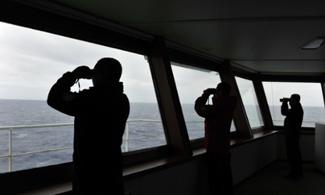 Crew members of Chinese icebreaker Xuelong which is on its way to the search zone in the Indian ocean.