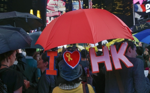 Biểu tình ở Quảng trường Thời đại, New York - Mỹ ngày 2-10. Ảnh: Reuters