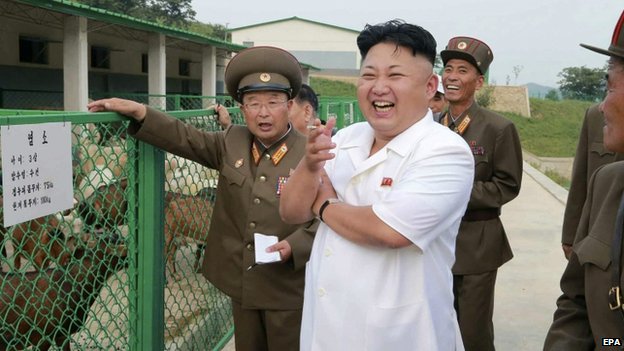 North Korean leader Kim Jong-un (C) reacting as he visits the North Korean People&apos;s Army Breeding Station No. 621