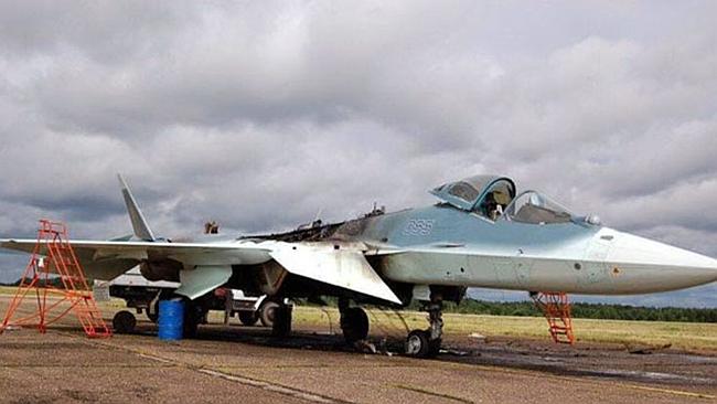 Burnout ... The Sukhoi T-50 stealth fighter shows the damage to its fuselage after an eng