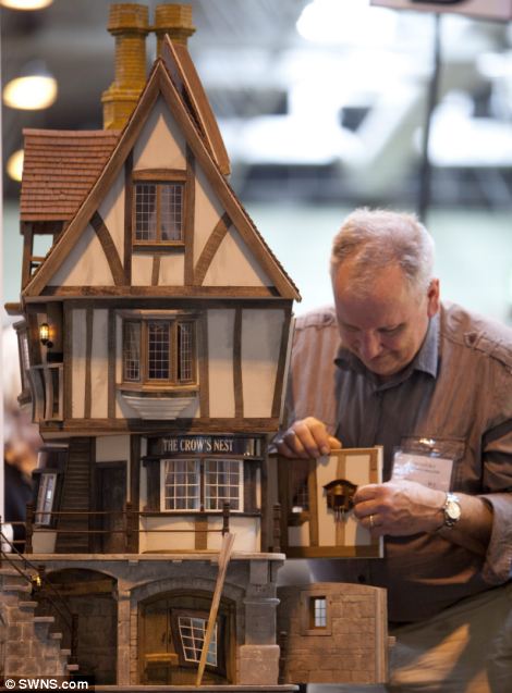 A miniature doll house on show at the Miniatura exhibition and trade show at the NEC in Birmingham