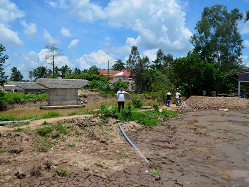 Cầu Tân Mỹ xây trên đất của gia đình ông Thuận nhưng gia đình ông không nhận được quyết định cưỡng chế lẫn tiền bồi thường