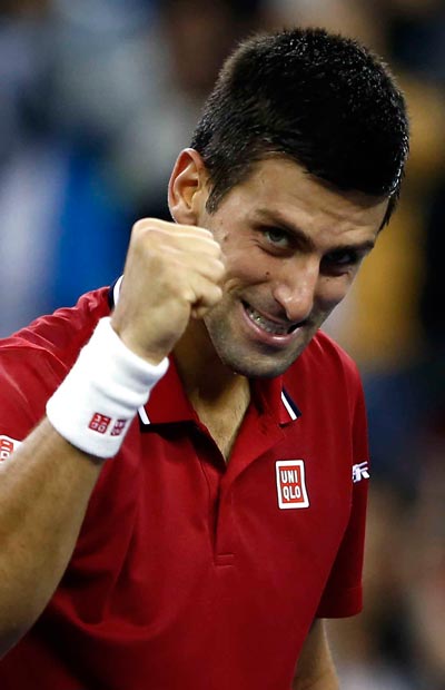 Djokovic có chiến thắng vất vả tối 9-10, vào tứ kết gặp Ferrer   Ảnh: REUTERS