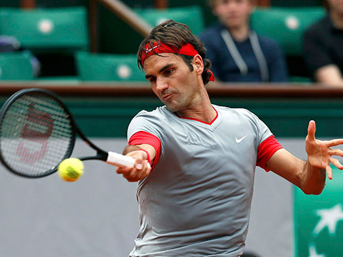 Federer thắng Lacko 3 ván trắng vào tối 25-5  
Ảnh: REUTERS