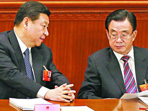 Ông Hạ Quốc Cường (phải) bên Chủ tịch Trung Quốc Tập Cận BìnhẢnh: MẠNG TINH ĐẢO TOÀN CẦU
