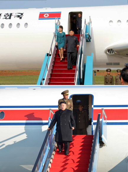 Kim Jong-un và vợ bước xuống từ chiếc máy bay lạ. Ảnh: The Hankyoreh