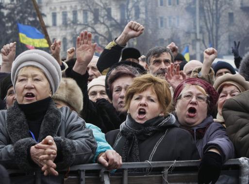 People shout slogans during an anti-government rally in Kiev February 9, 2014. REUTERS-Gleb Garanich