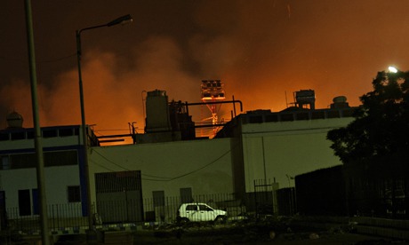 Fire illuminate the sky above Jinnah International Airport in Karachi