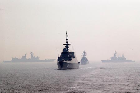 Peoples Liberation Army vessels take part in a naval exercise in the South China Sea, April 23. (Photo/CNS)