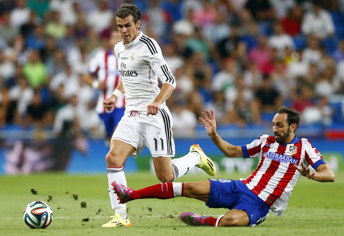 Gareth Bale cần mẫn làm bóng cho đồng đội, mối đe dọa thường xuyên cho hàng thủ Atletico