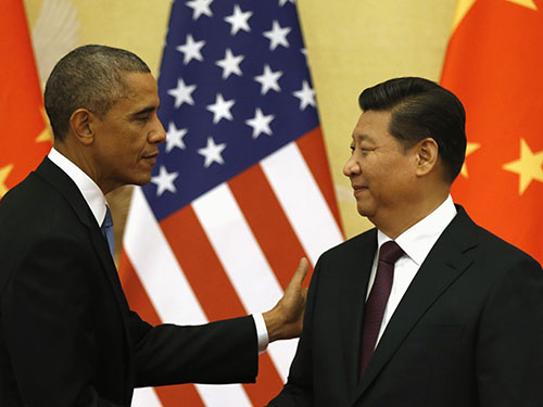 Tổng thống Mỹ Barack Obama (trái) và Chủ tịch Tập Cận Bình tại cuộc họp báo ở Bắc Kinh hồi tháng 11 Ảnh: Reuters