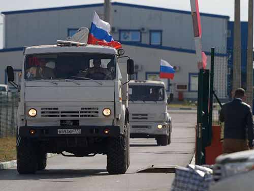 Đoàn xe chở hàng cứu trợ thứ hai của Nga cho miền Đông Ukraine đã về đến Nga hôm 14-9 Ảnh: RIA NOVOSTI