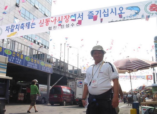 Minh Hùng tác nghiệp ở ASIAD Busan 2002