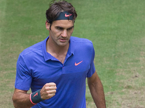 Federer đang chơi tốt trên mặt sân cỏ
Ảnh: EFE