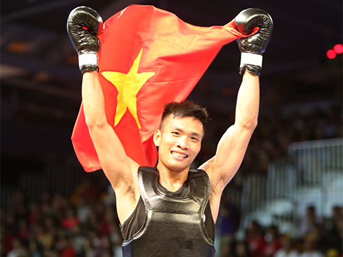 Võ sĩ wushu Nguyễn Văn Tài đã giành HCV hạng cân dưới 65 kg Ảnh: QUANG LIÊM