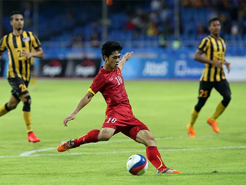 Công Phượng trong pha ghi bàn nâng tỉ số 2-0 cho U23 Việt Nam Ảnh: QUANG LIÊM