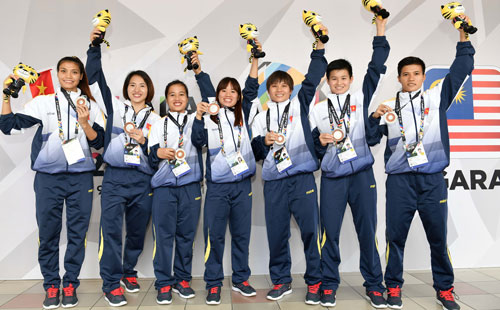 Futsal: Nữ giành HCB, nam đạt HCĐ - Ảnh 1.